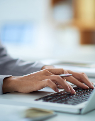 Business Woman Working on a Laptop